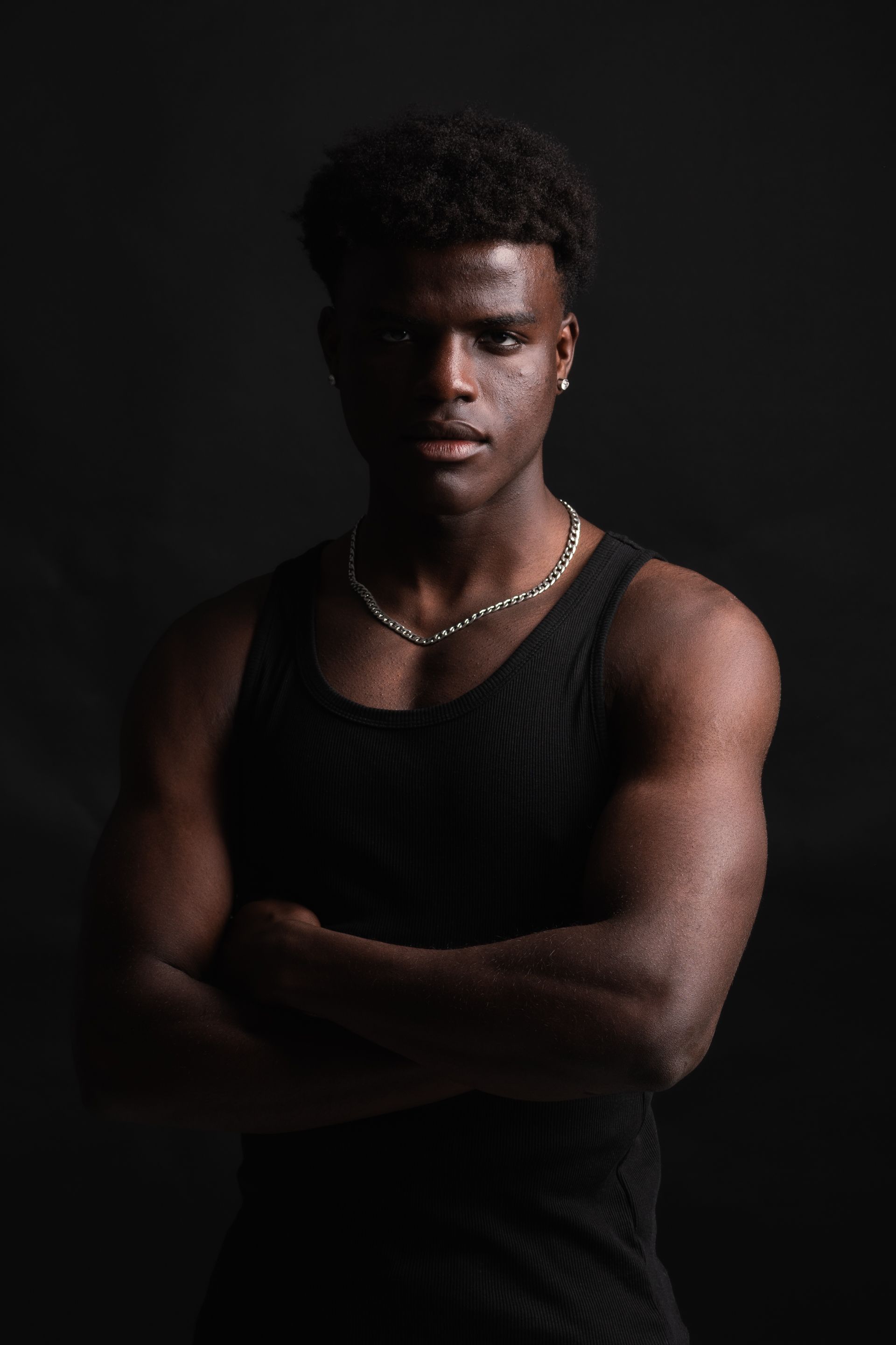 Portrait of a Strong Male Model in Studio Lighting · Free Stock Photo