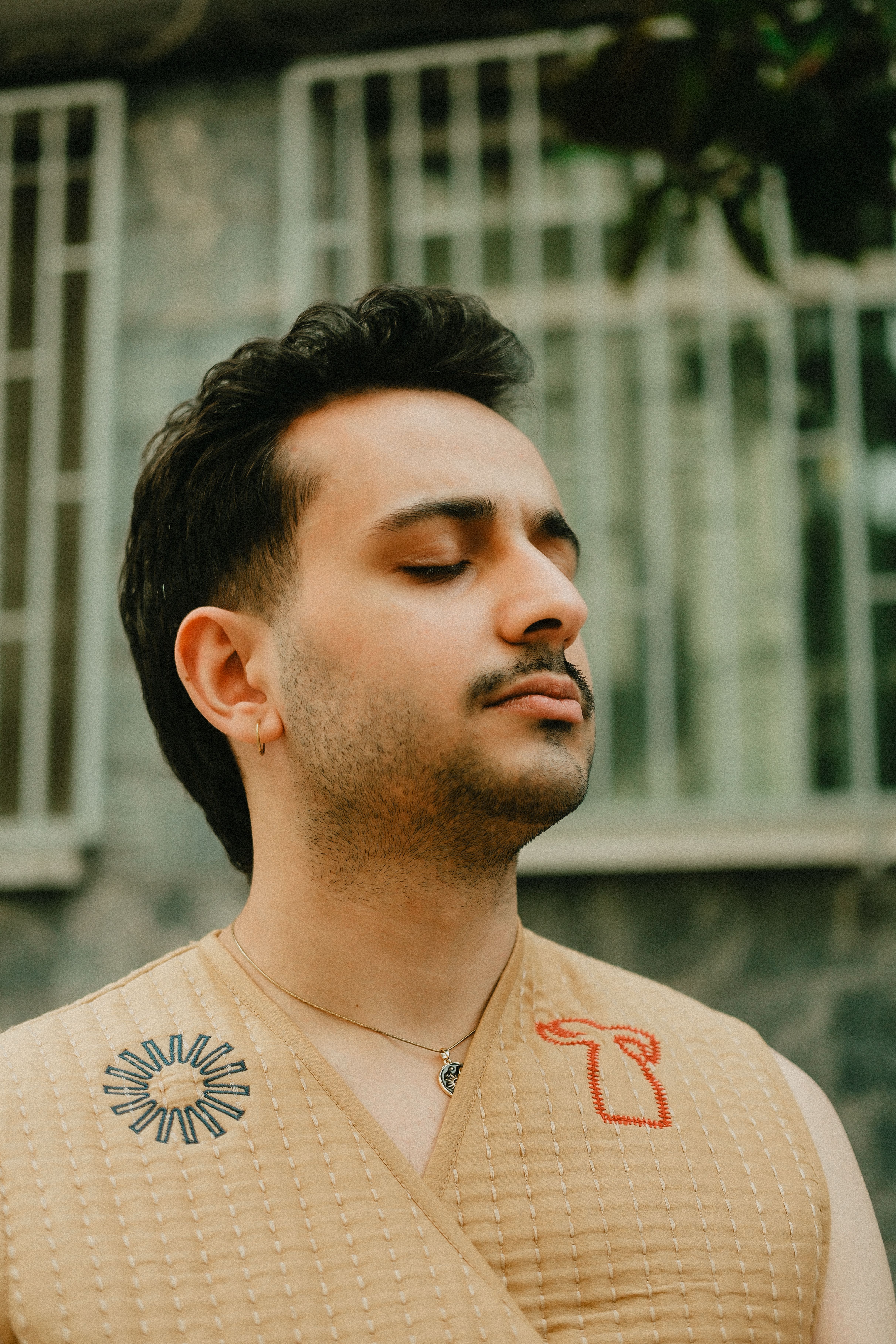 Portrait of a man meditating peacefully outdoors in İstanbul, Türkiye