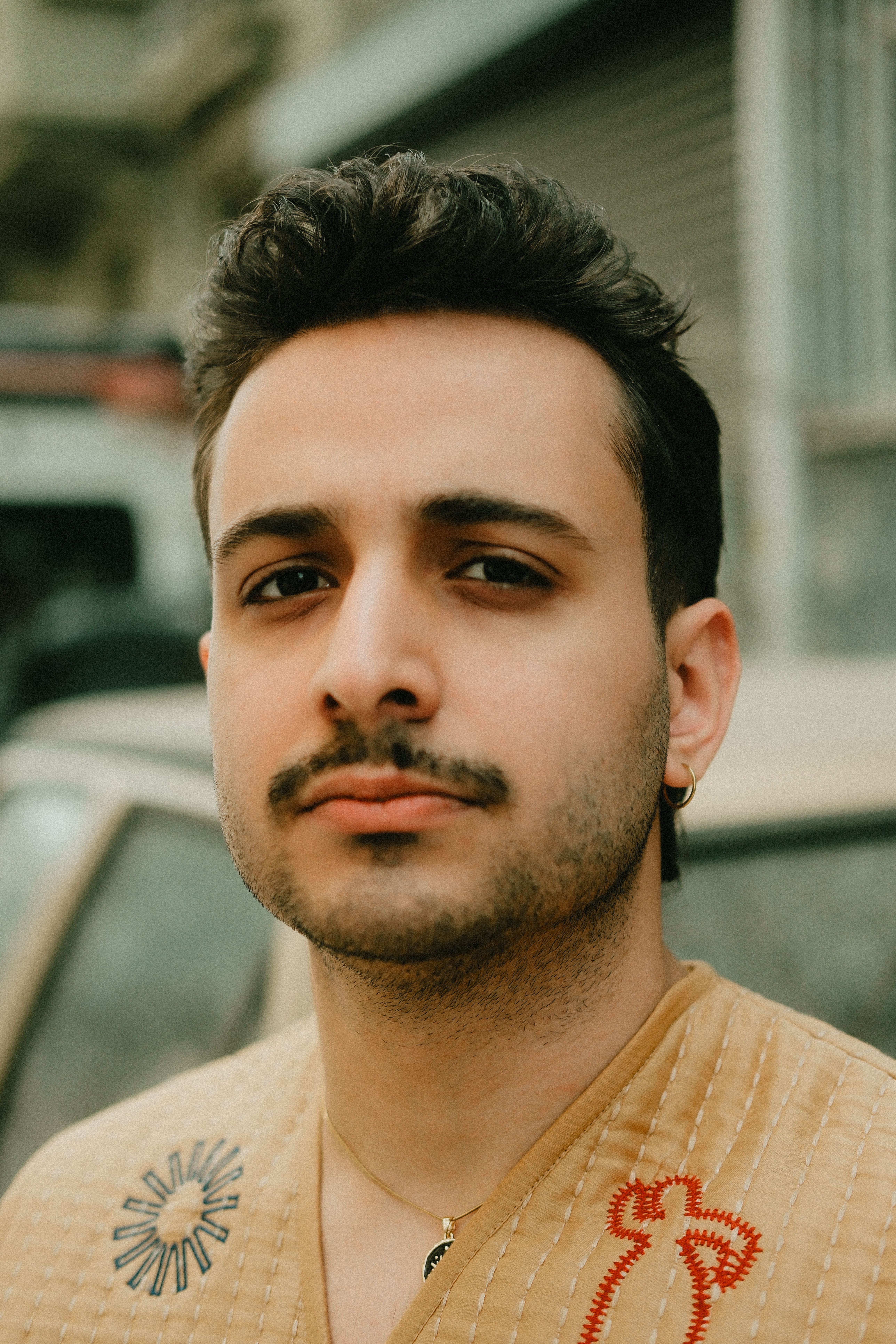 Casual Portrait of Young Man Outdoors