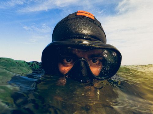 Free Close-up of diver in Red Sea, Egypt, showcasing adventure under the water. Stock Photo