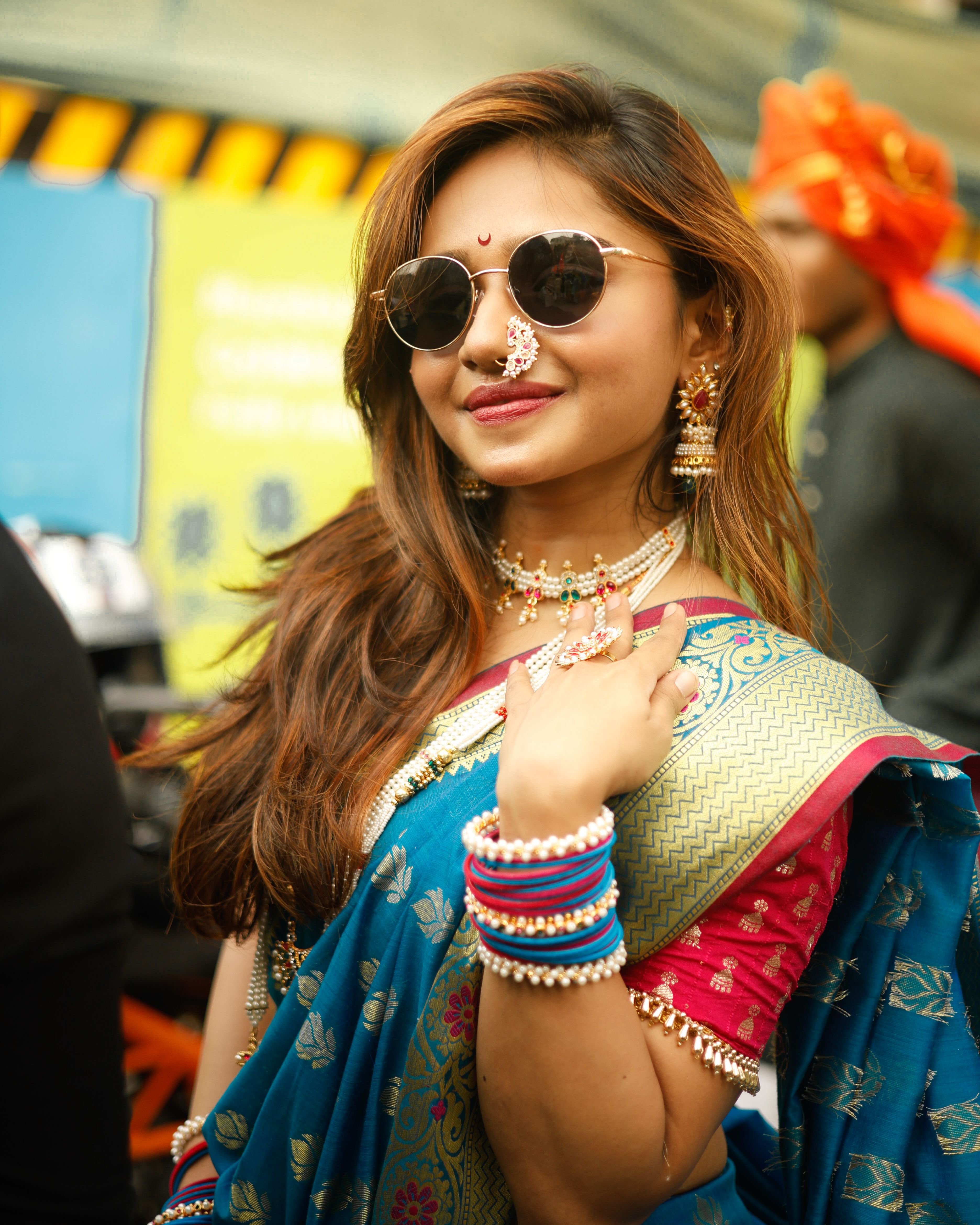 Colorful Portrait of Stylish Woman in Traditional Attire · Free Stock Photo
