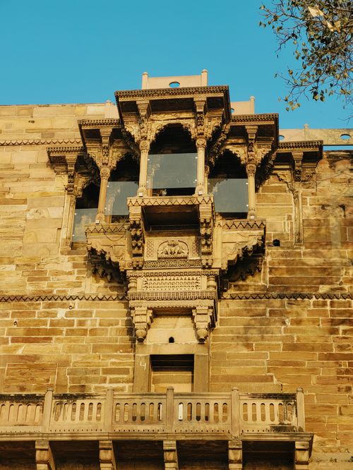 Free Intricate architectural detail of historic building facade in Varanasi, India. Stock Photo