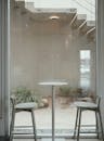 Minimalist Cafe Table with Window View