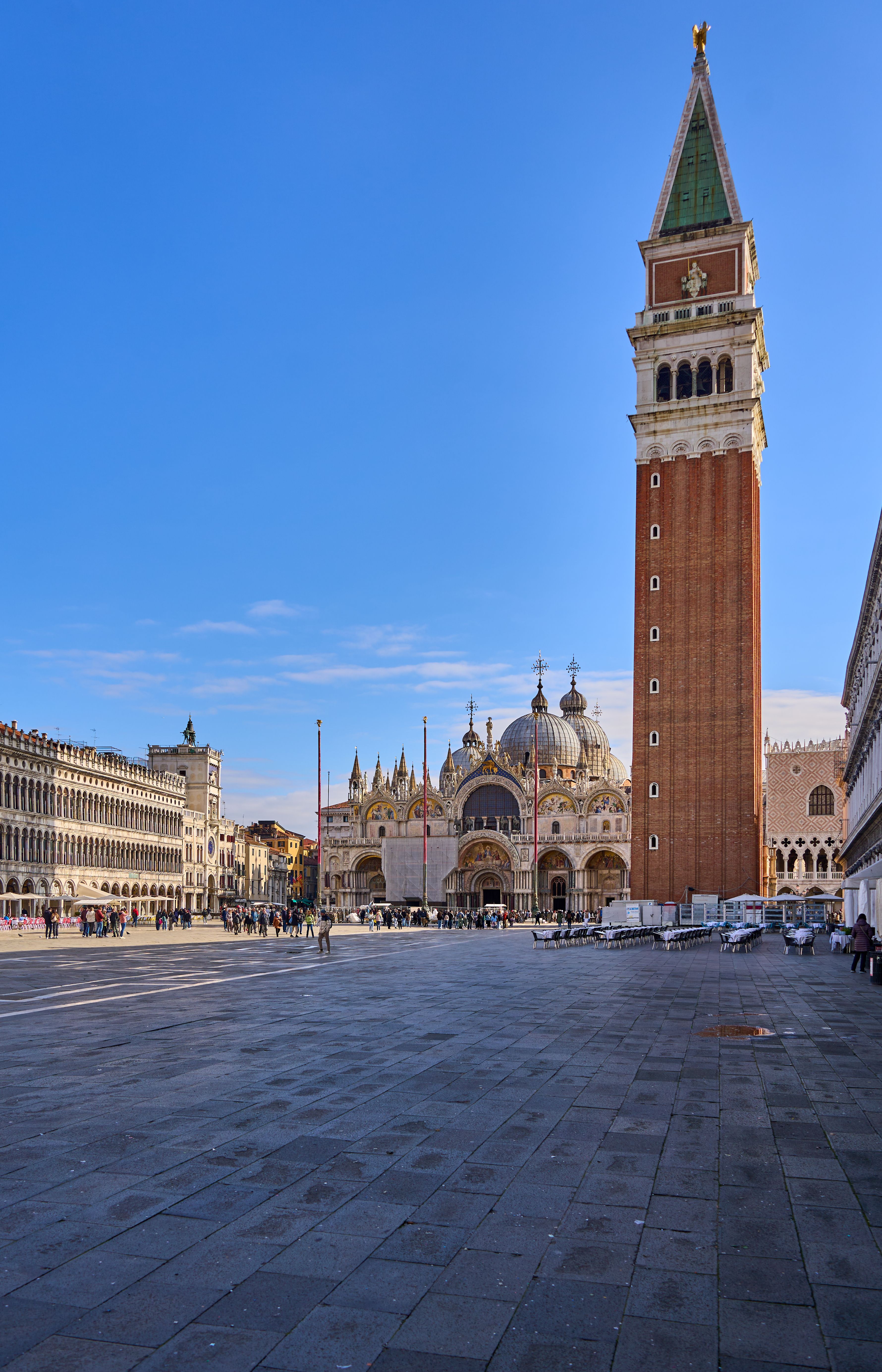 Clear day at St. Mark's Square, Venice showcasing the Campanile and St. Mark's Basilica.