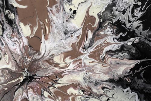Free Dynamic fluid art featuring swirling neutral tones with a mix of bold patterns. Stock Photo