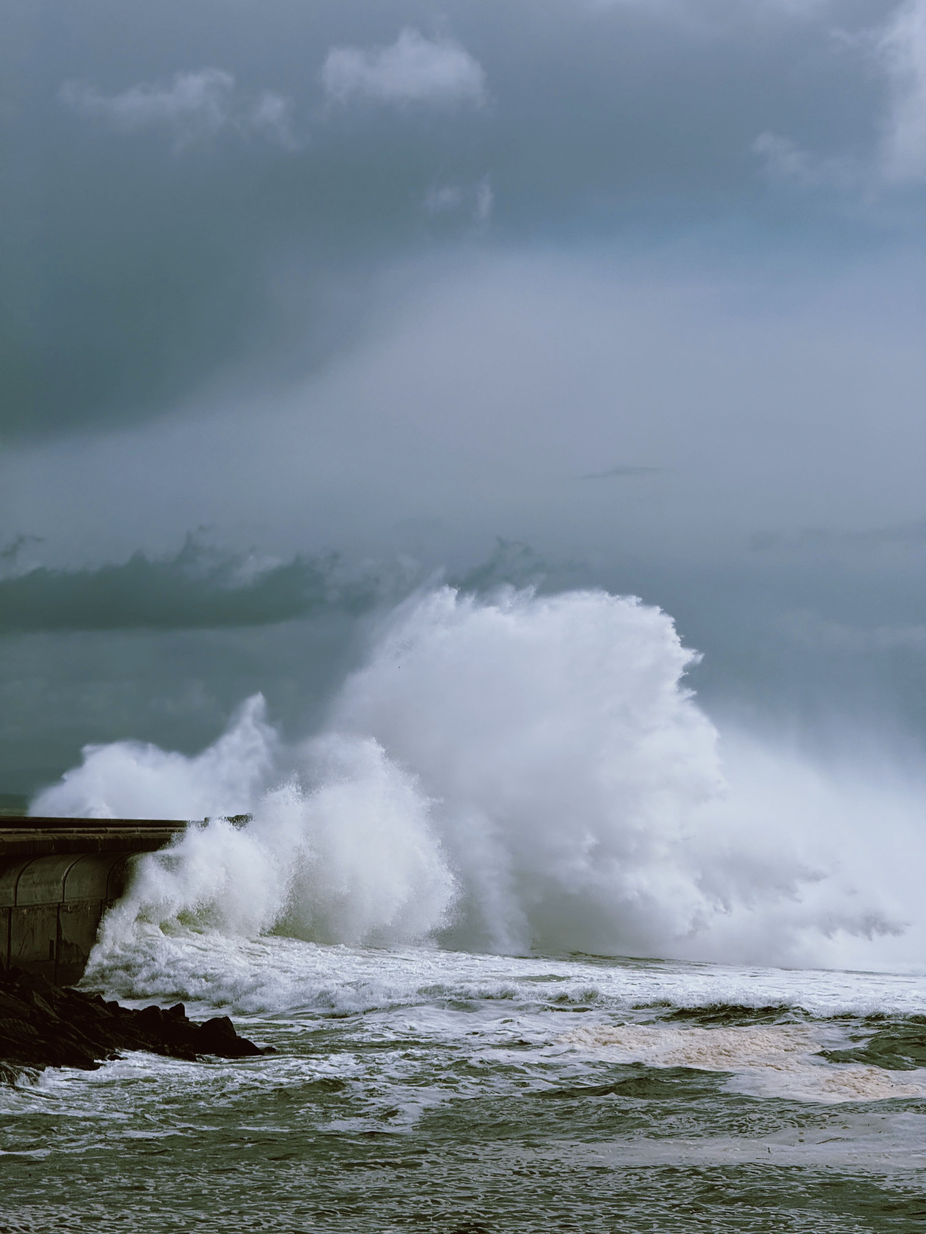 Powerful Ocean Waves Crashing Against Seawall · Free Stock Photo