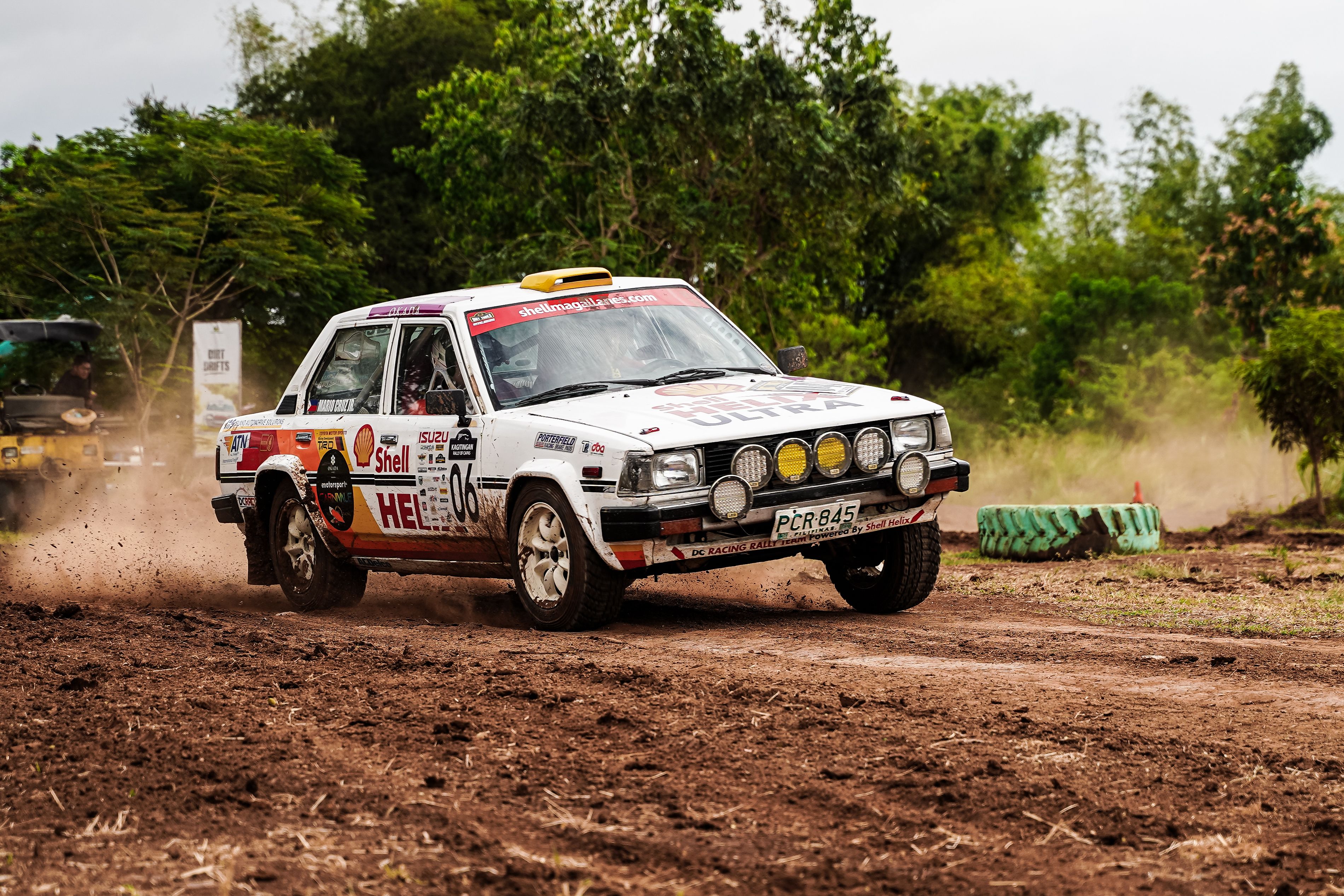 Rally Car Racing on Dirt Track in Action · Free Stock Photo