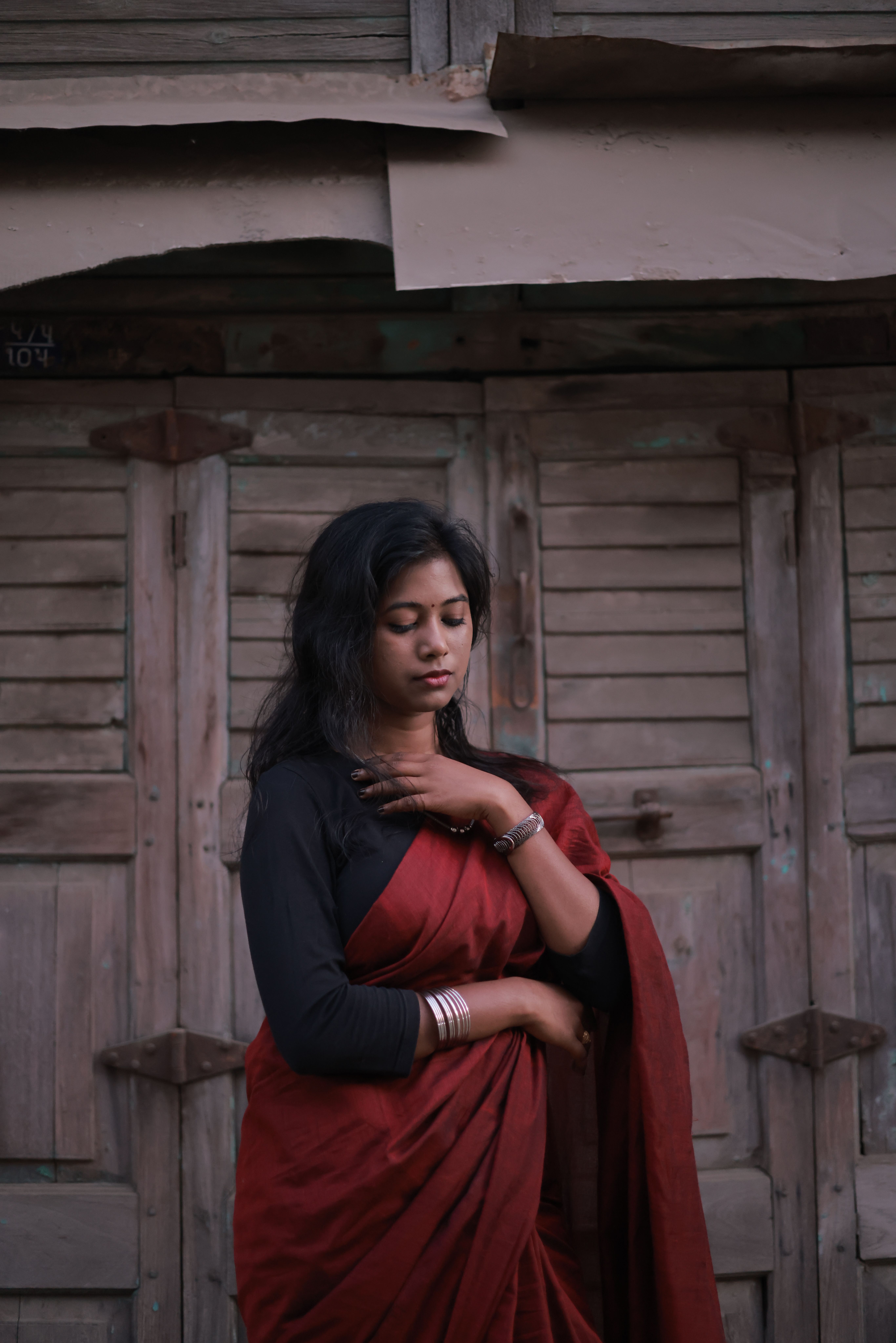Thoughtful Woman in Traditional Red Saree · Free Stock Photo