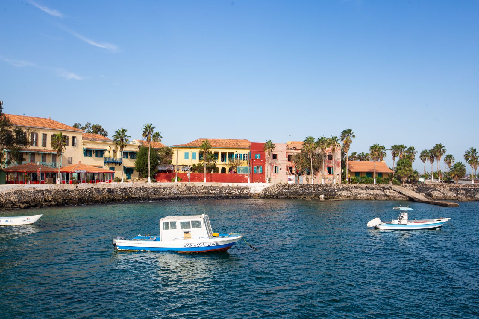Waterfront buildings and boats in Senegal