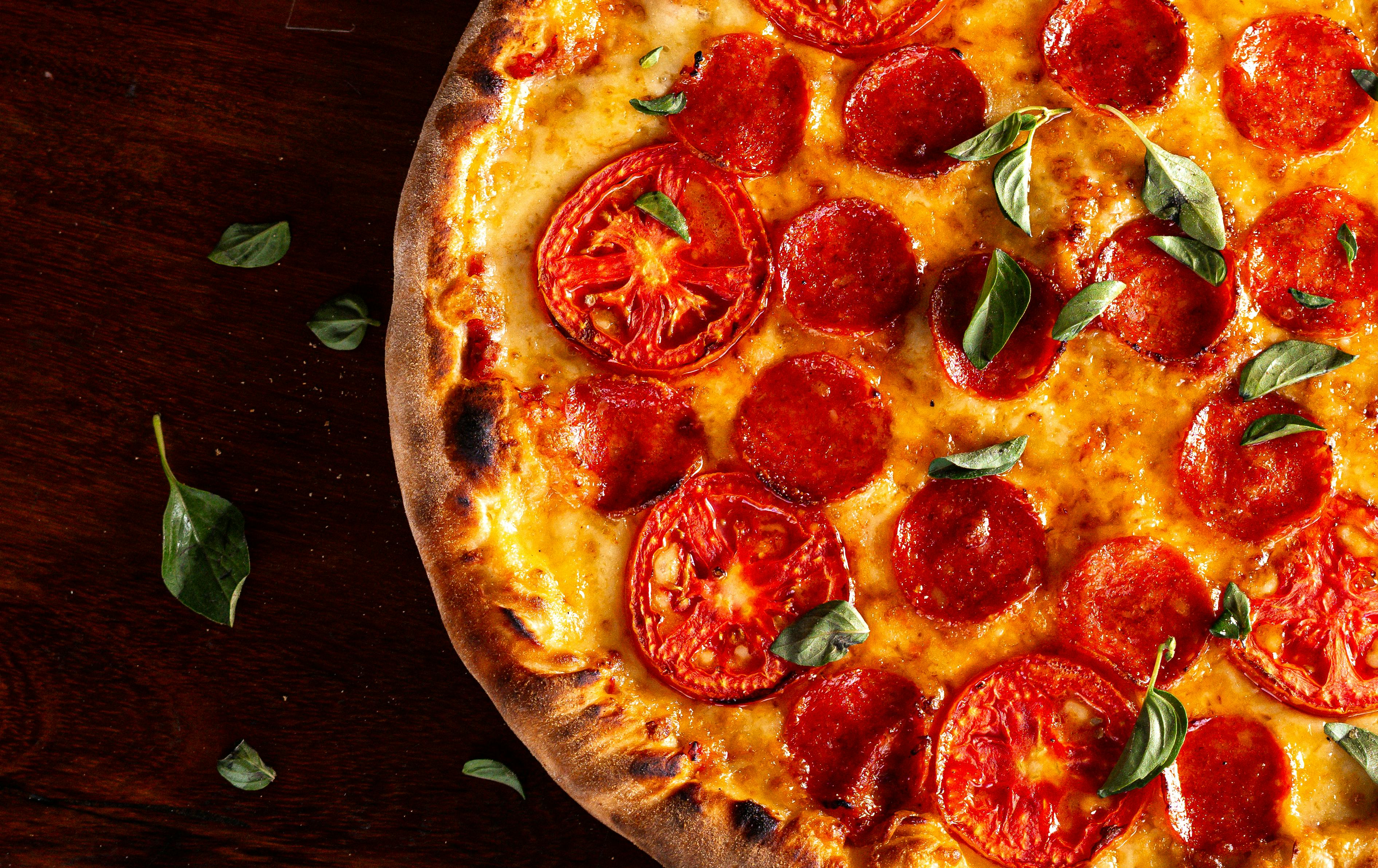 Smoky BBQ chicken pizza with caramelized onions