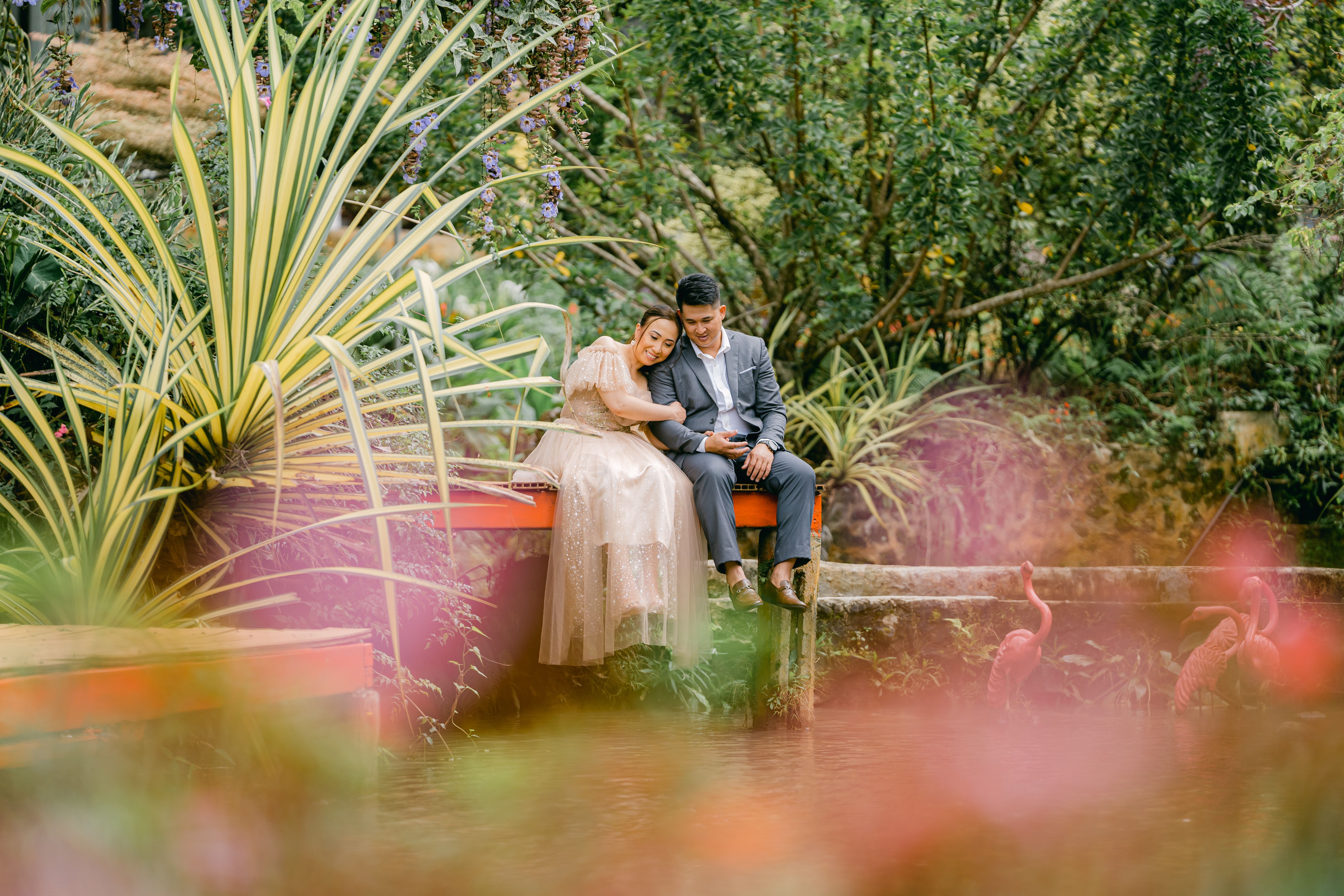 Romantic Couple in Lush Garden Setting · Free Stock Photo
