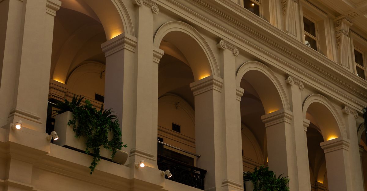 Classical Atrium Ramsa Elegant Indoor Atrium with Classical Arches · Free Stock Photo