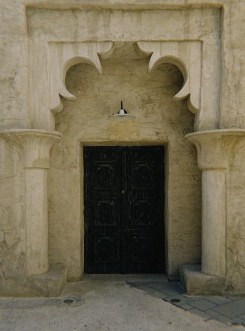 Free Ornate historical doorway with Islamic design in Old Dubai, UAE. Stock Photo