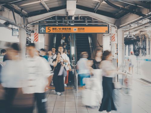 Free Blurred commuters at Shinjuku Station, Tokyo, capturing bustling city energy. Stock Photo