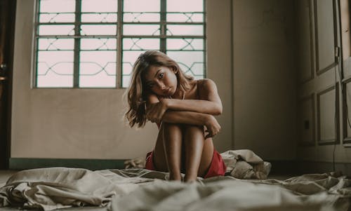 Free Photo Of Woman Sitting On Floor Stock Photo