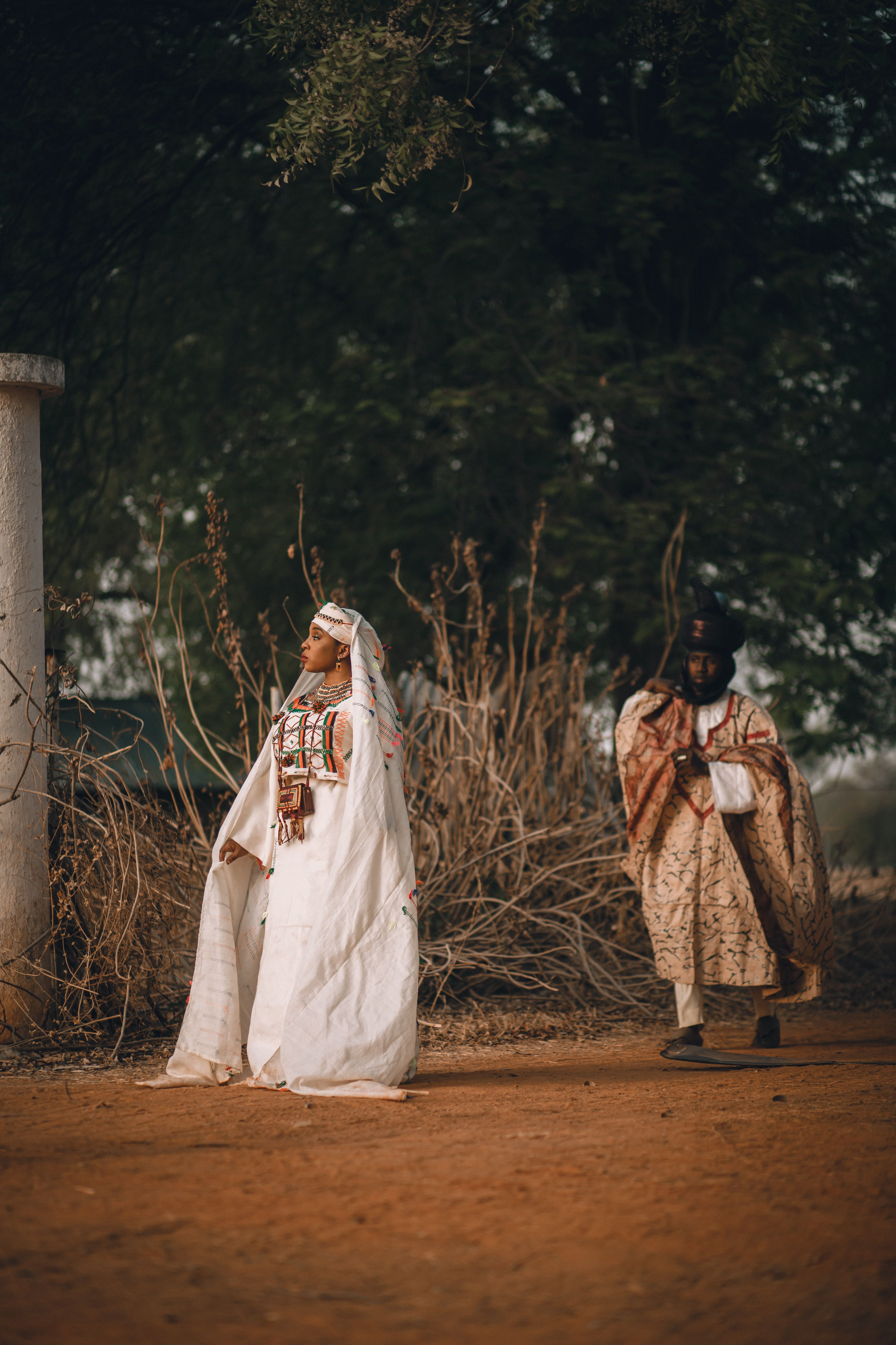 Cultural Portrait of Two People in Traditional Attire · Free Stock Photo