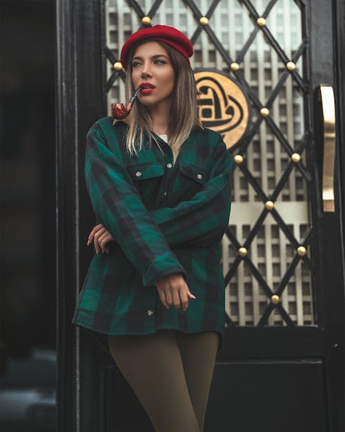 Woman Smoking With A Pipe