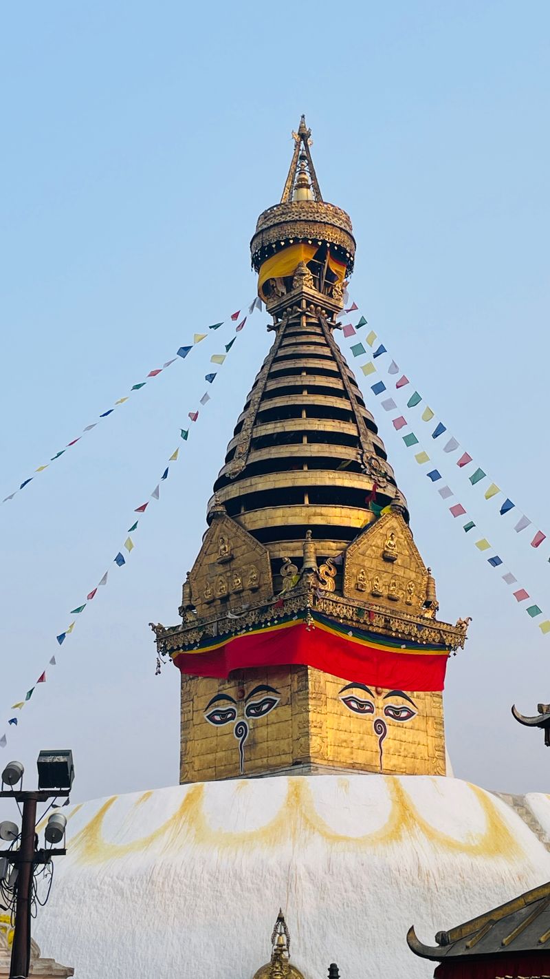 Swayambhunath stupa with Buddha eyes and prayer flags in Kathmandu