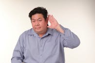 Man Listening Gesture Studio Portrait