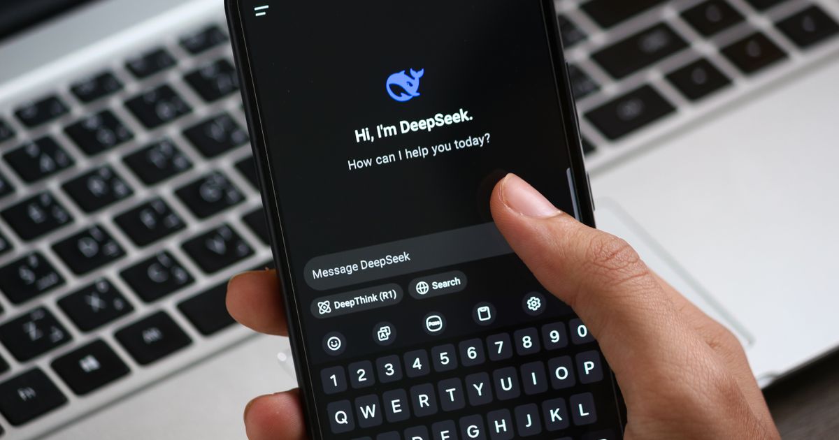 Person interacting with an AI chat app on a smartphone.