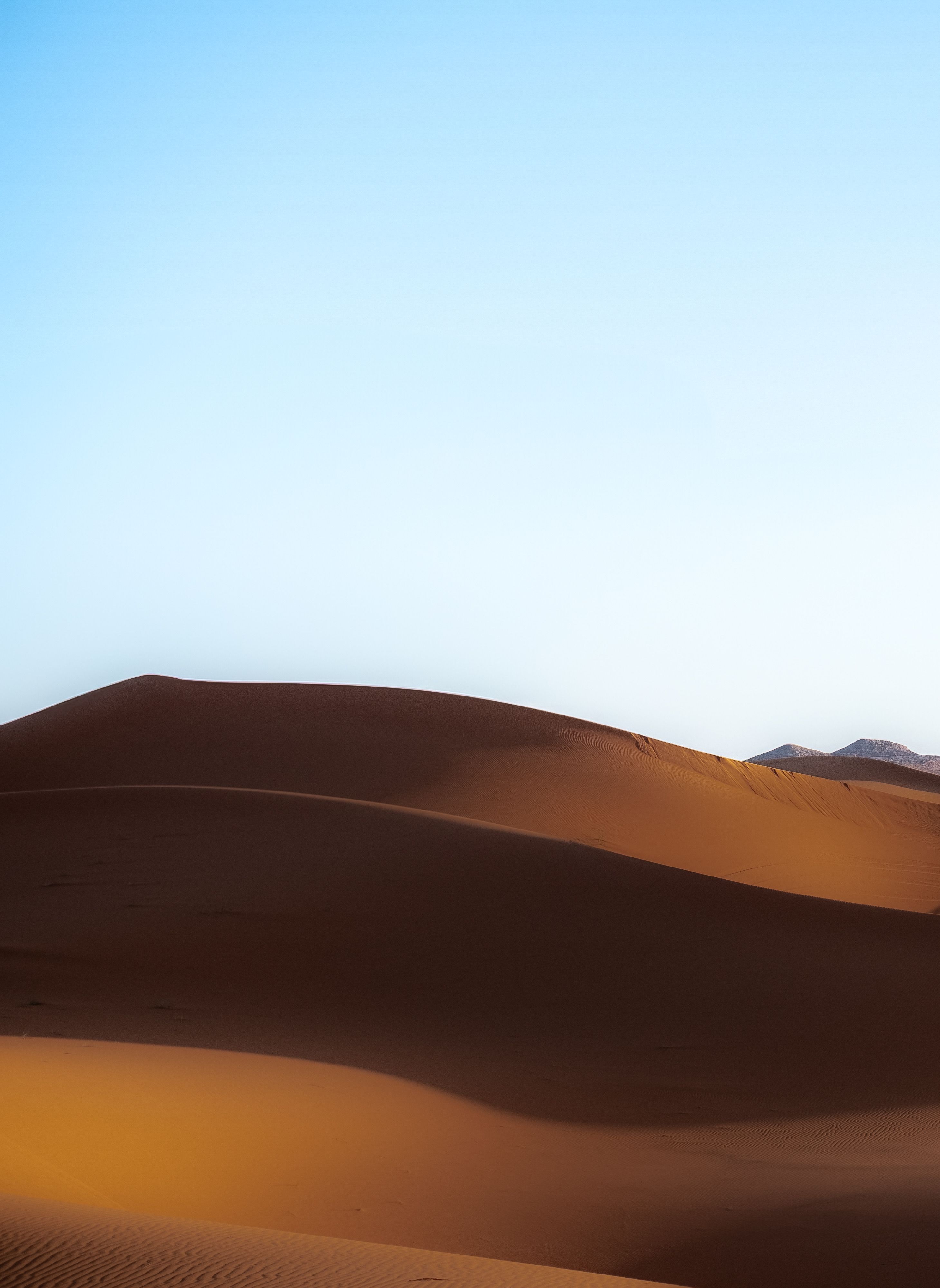 Majestic Golden Sand Dunes Under Clear Sky · Free Stock Photo