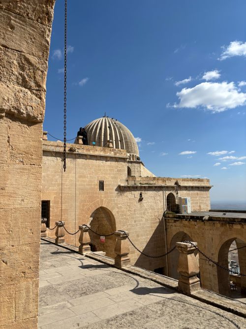 Free Explore the historic stone architecture and iconic dome in Mardin, Türkiye. Stock Photo
