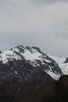 Majestic snowy mountain peaks in Jaca, Aragón, showcasing natural beauty.