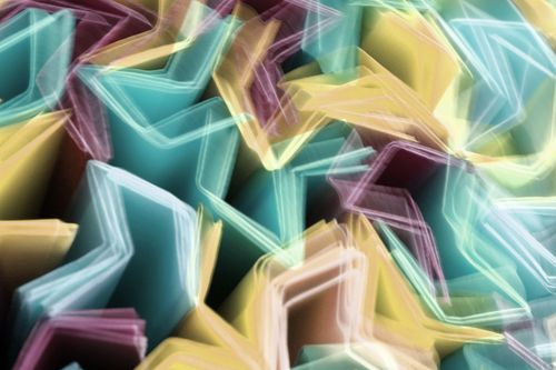 Free Vivid abstract composition of colorful geometric light trails in motion. Stock Photo