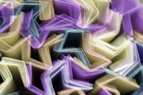Free Dynamic abstract image featuring vibrant, colorful geometric shapes in motion blur, creating a lively visual rhythm. Stock Photo