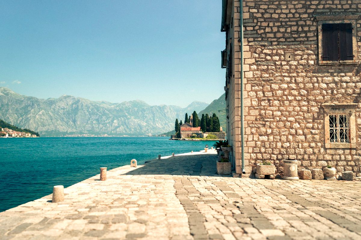 A historic stone building by the bay in Montenegro — the Venetian waterfront architecture of Boka