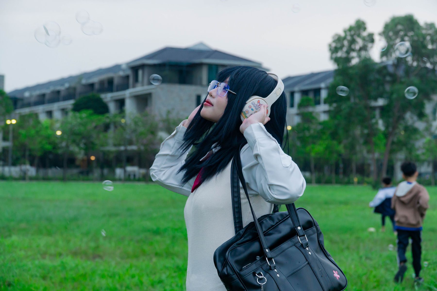 972 Costa Brava Lifestyle — Young woman listening to music surrounded by greenery