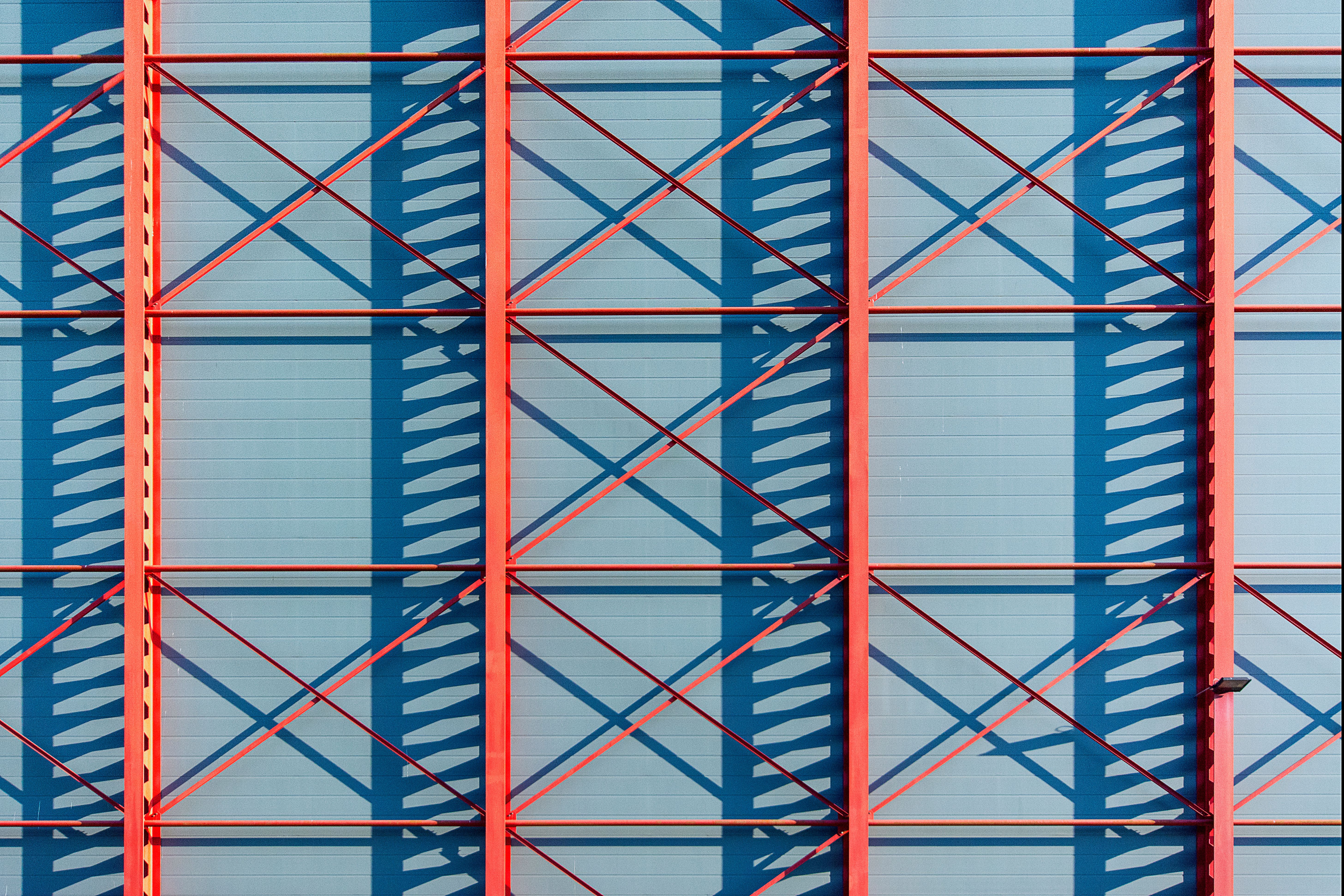 Industrial Red Framework with Blue Shadows