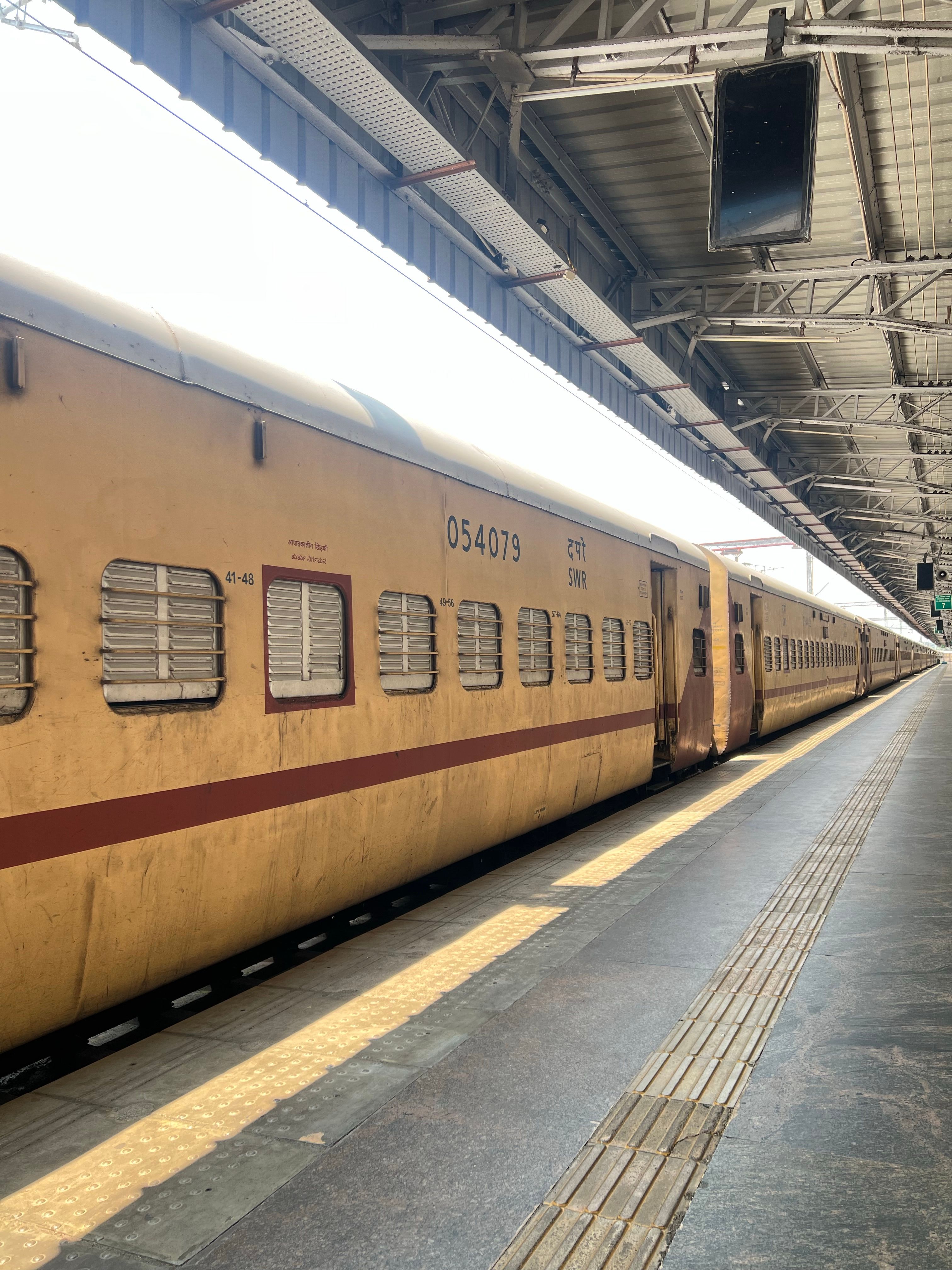 Yellow Train on a Platform with Steel Roof · Free Stock Photo