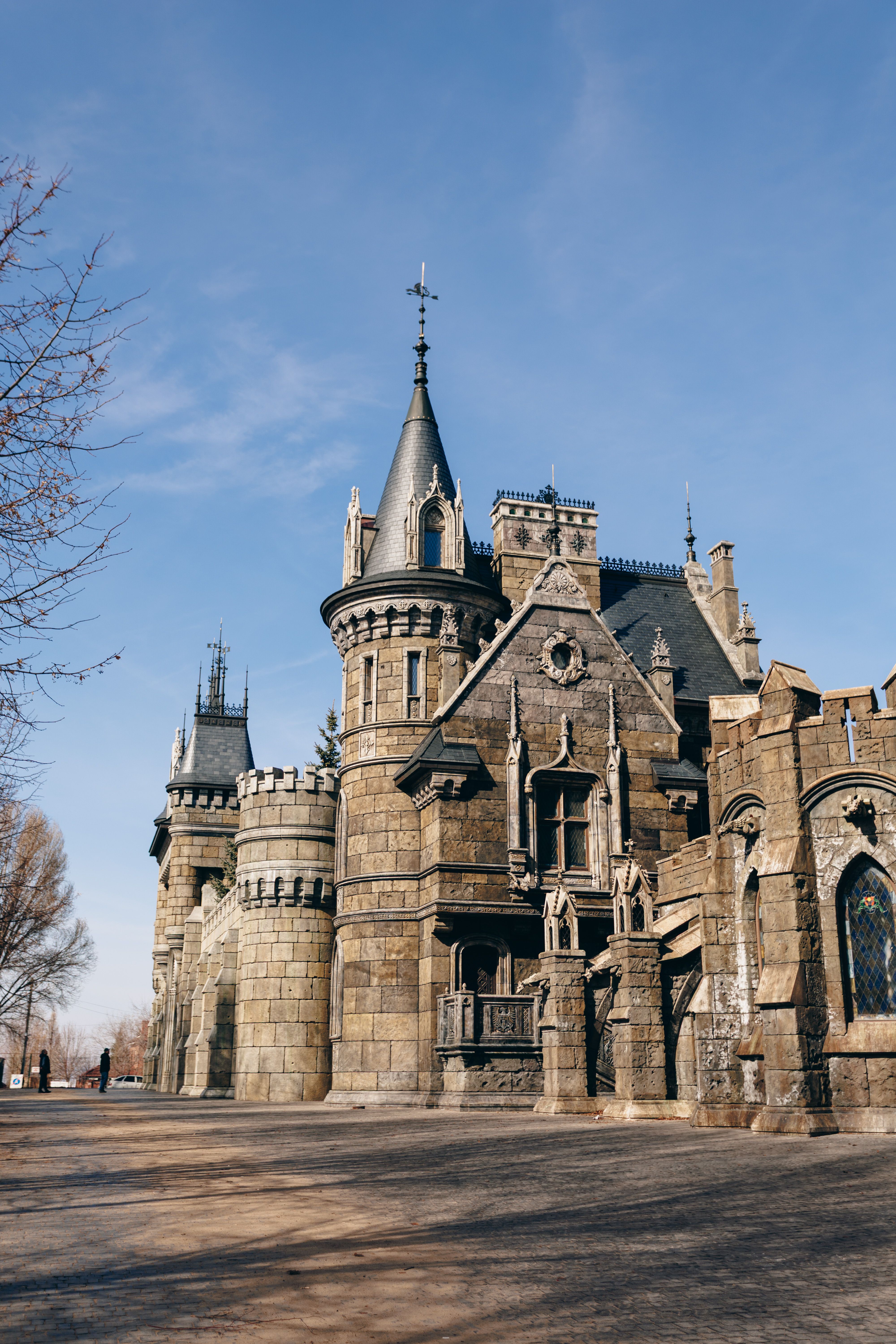 Majestic Medieval Castle under Clear Blue Sky · Free Stock Photo