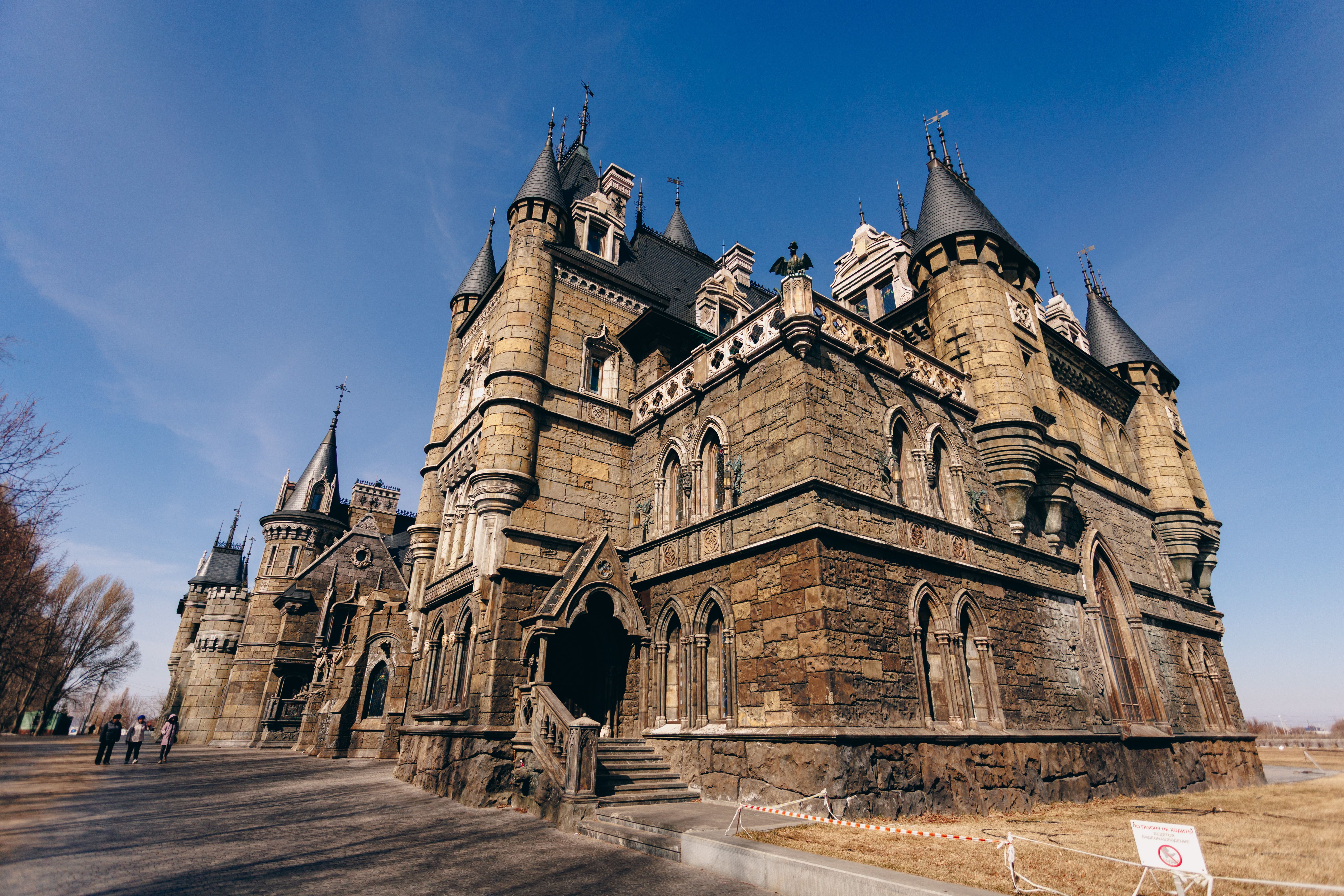 Majestic Medieval Castle under Clear Blue Sky · Free Stock Photo