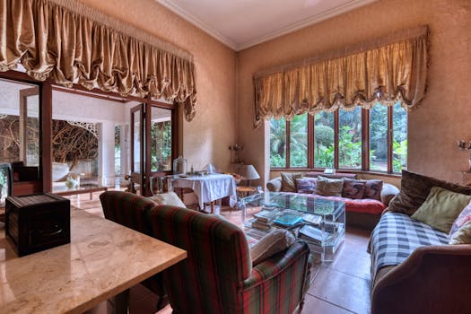 Inviting living room with open patio view combines comfort with style in a modern home.