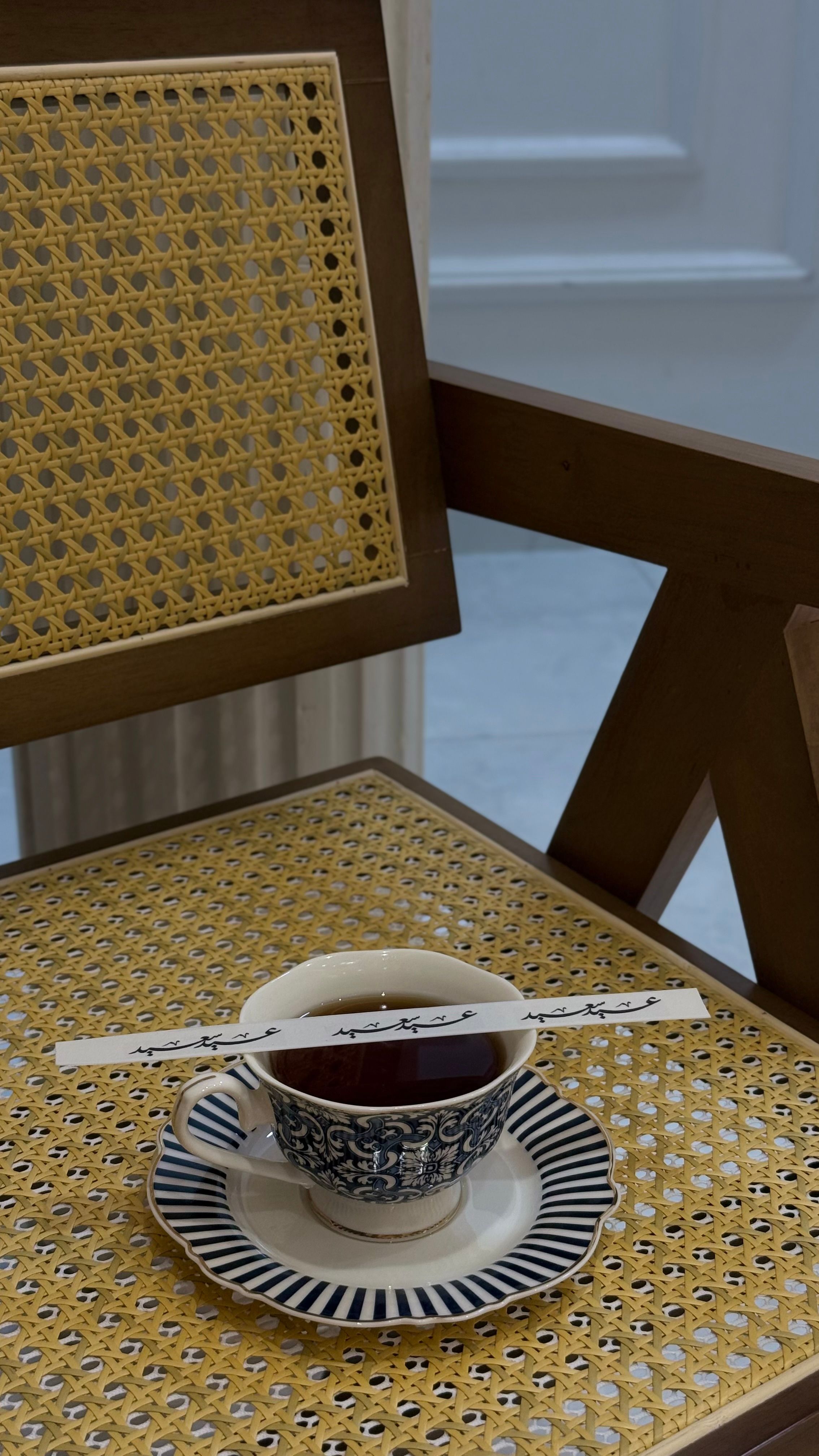 Elegant Tea Setting on Wicker Chair · Free Stock Photo