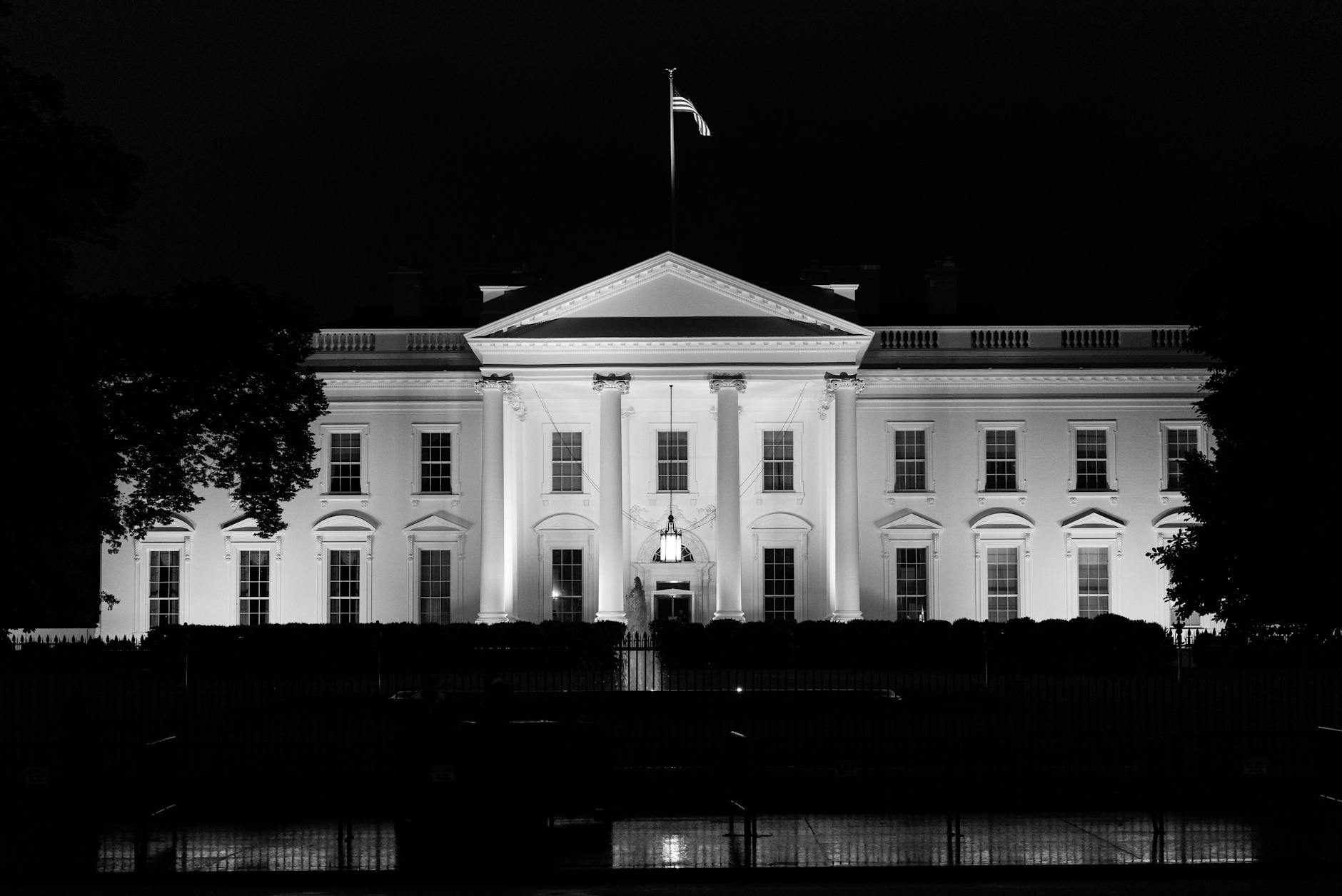 The iconic White House illuminated at night, Washington, D.C., USA.