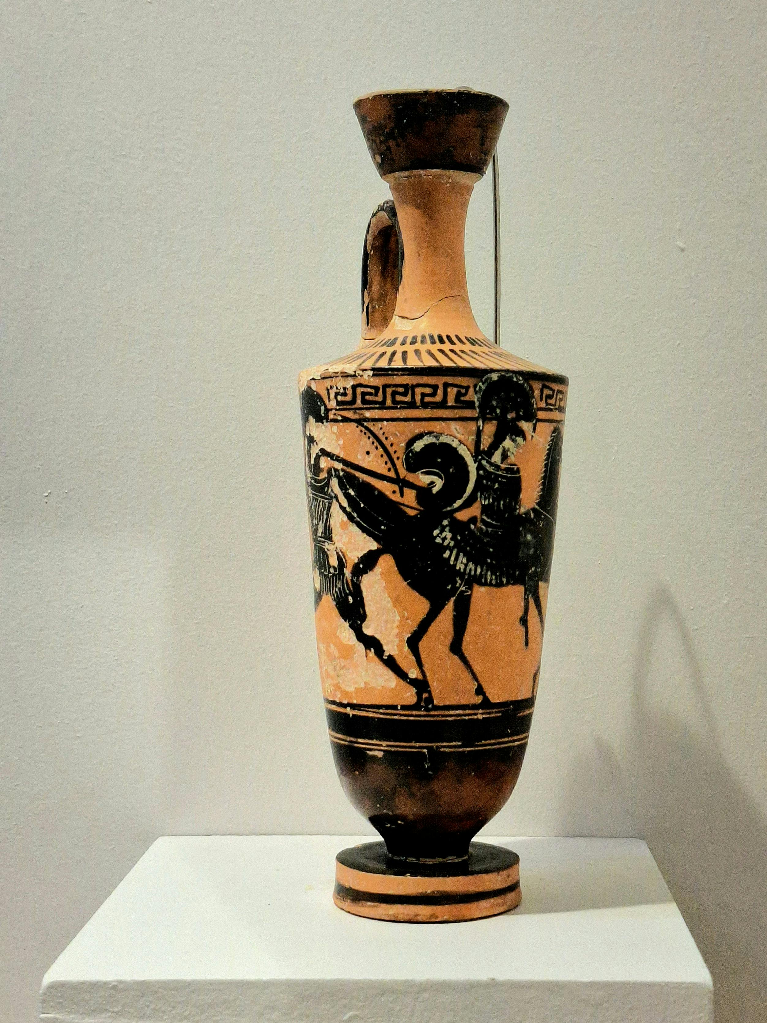 ancient greek black figure vase on display