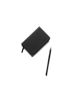 A sleek black notebook and pen on a clean white backdrop, ideal for productivity themes.