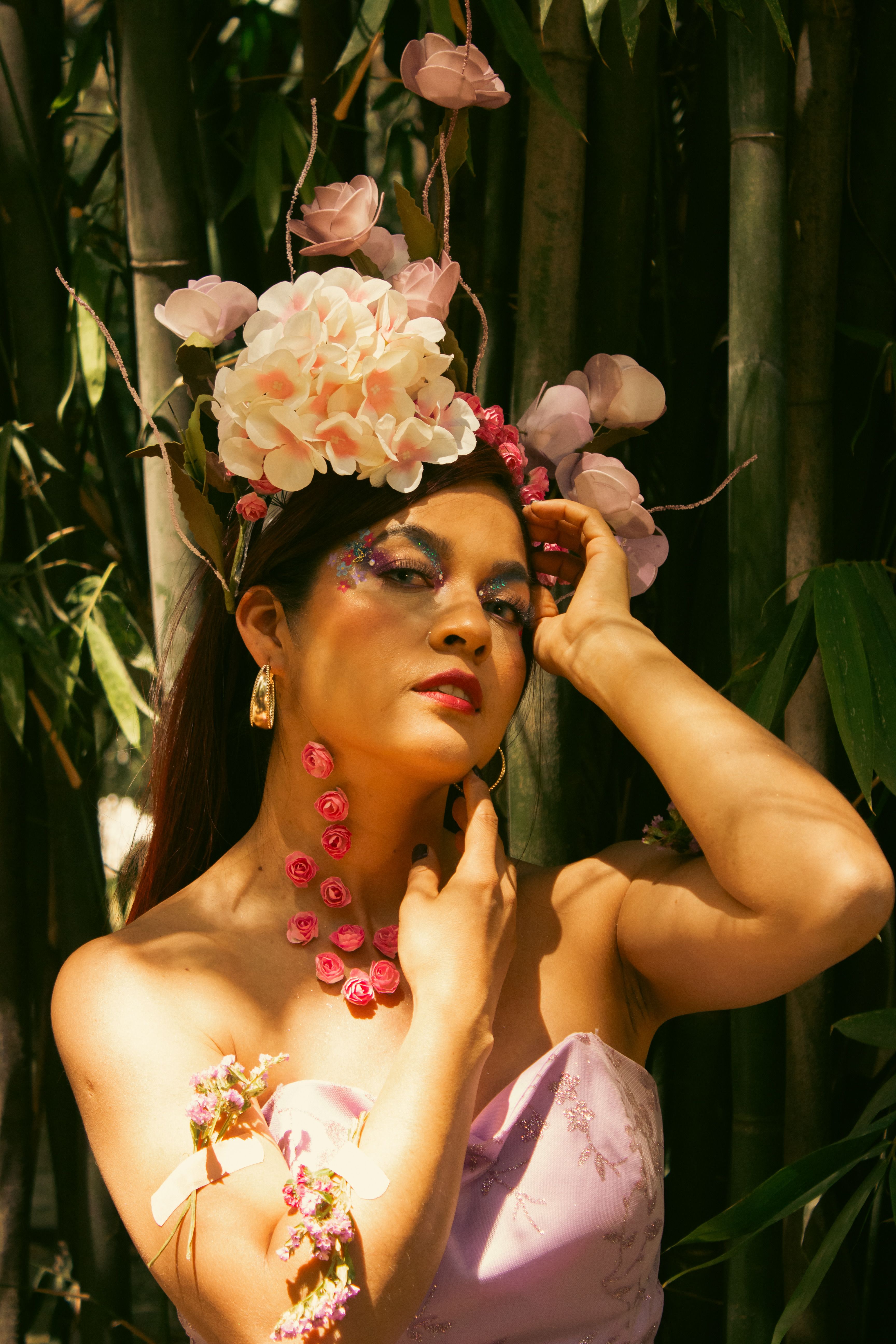 Elegant Woman with Floral Headpiece Outdoors · Free Stock Photo
