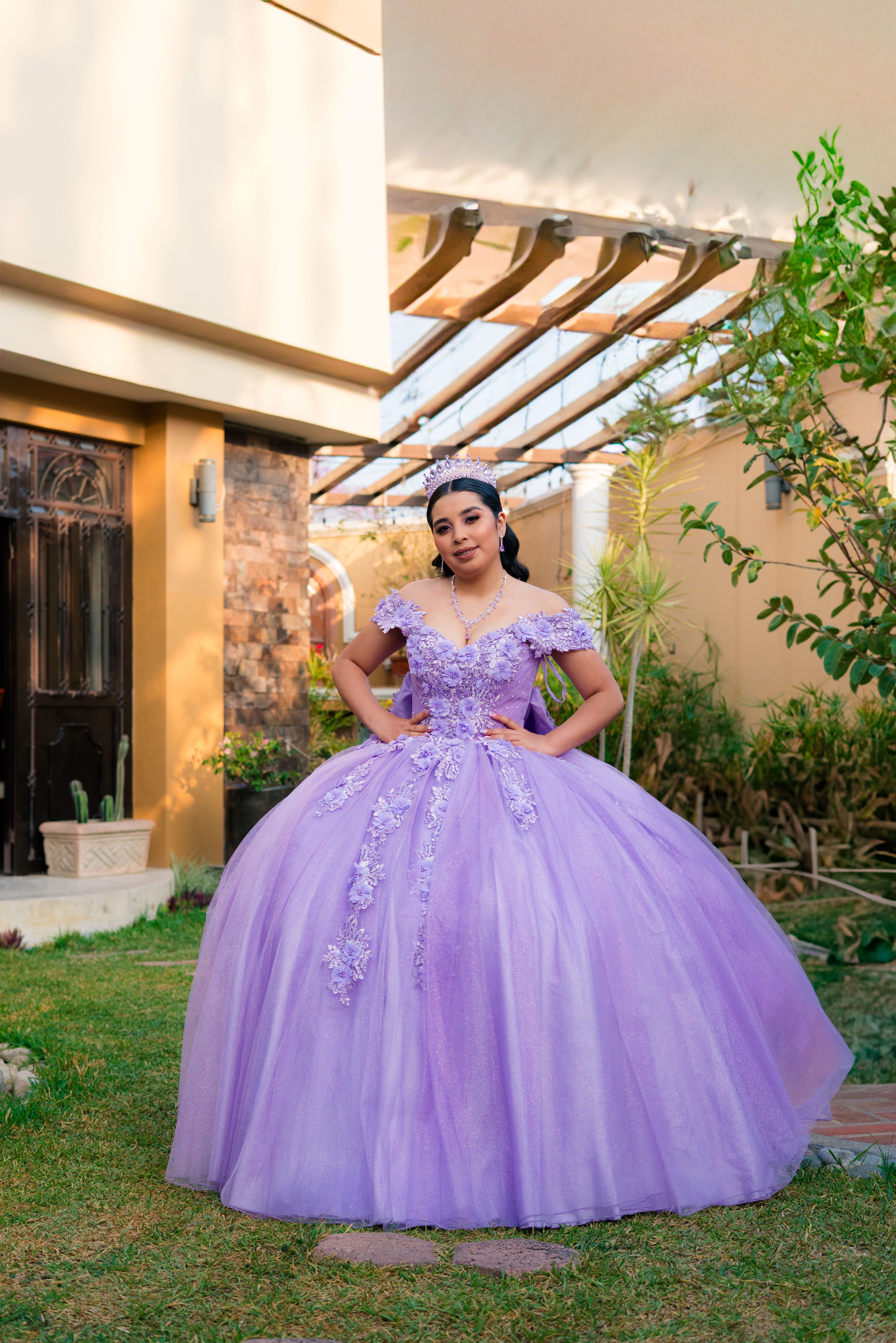 Young Woman in Elegant Lilac Evening Gown Outdoors · Free Stock Photo
