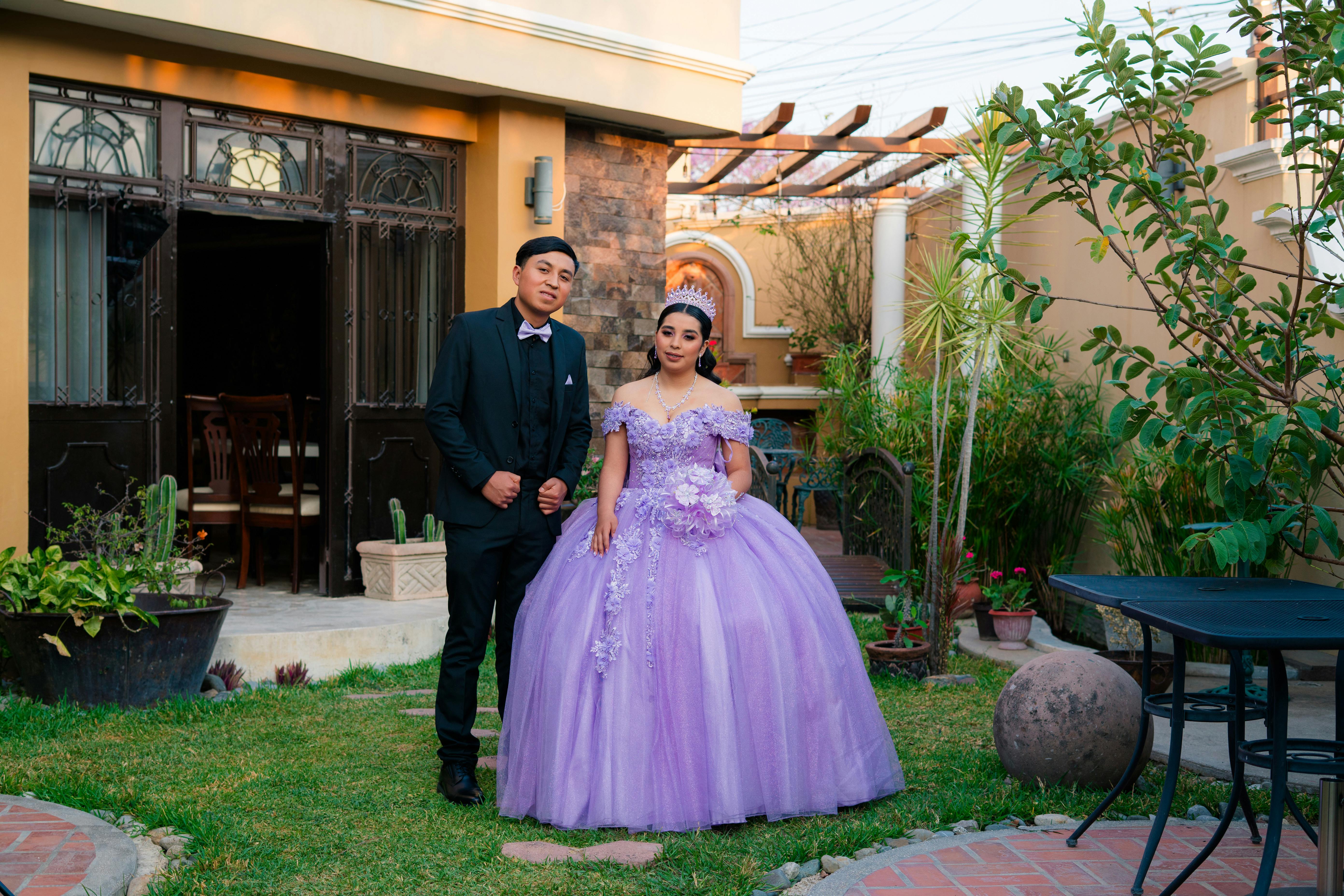 elegant couple posing for a quinceanera photoshoot