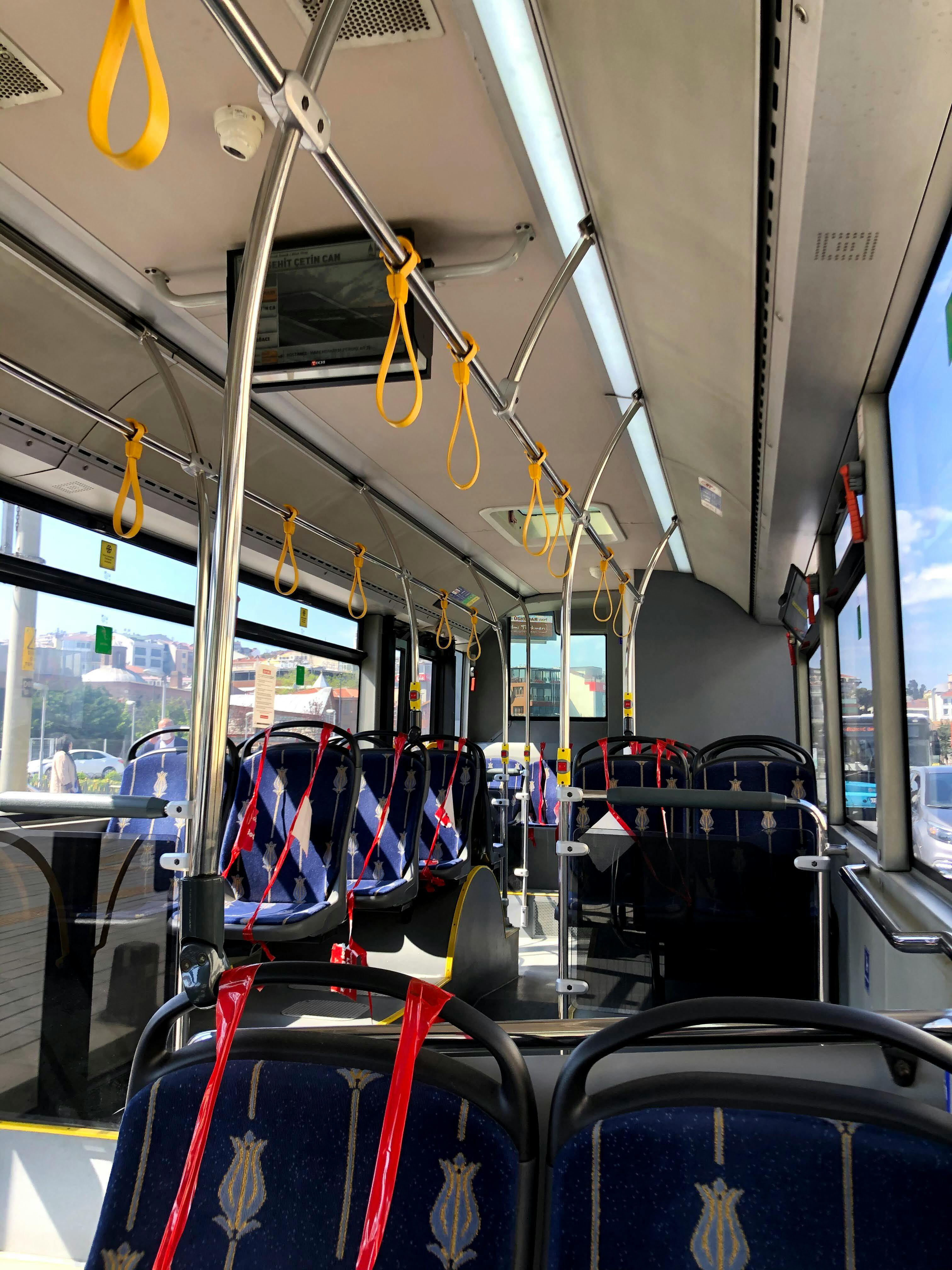 empty city bus interior with safety measures