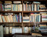 Cozy Bookshelf Filled with Vintage Books