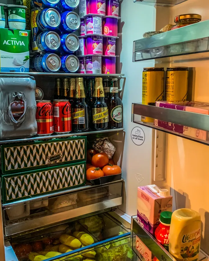 Thermador refrigerator repair in La Mesa, CA Well-stocked open refrigerator with drinks, fruit and dairy, Thermador refrigerator repair in La Mesa