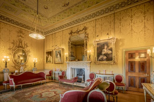 Luxurious vintage room in Harewood House, showcasing intricate decor and antique furnishings.