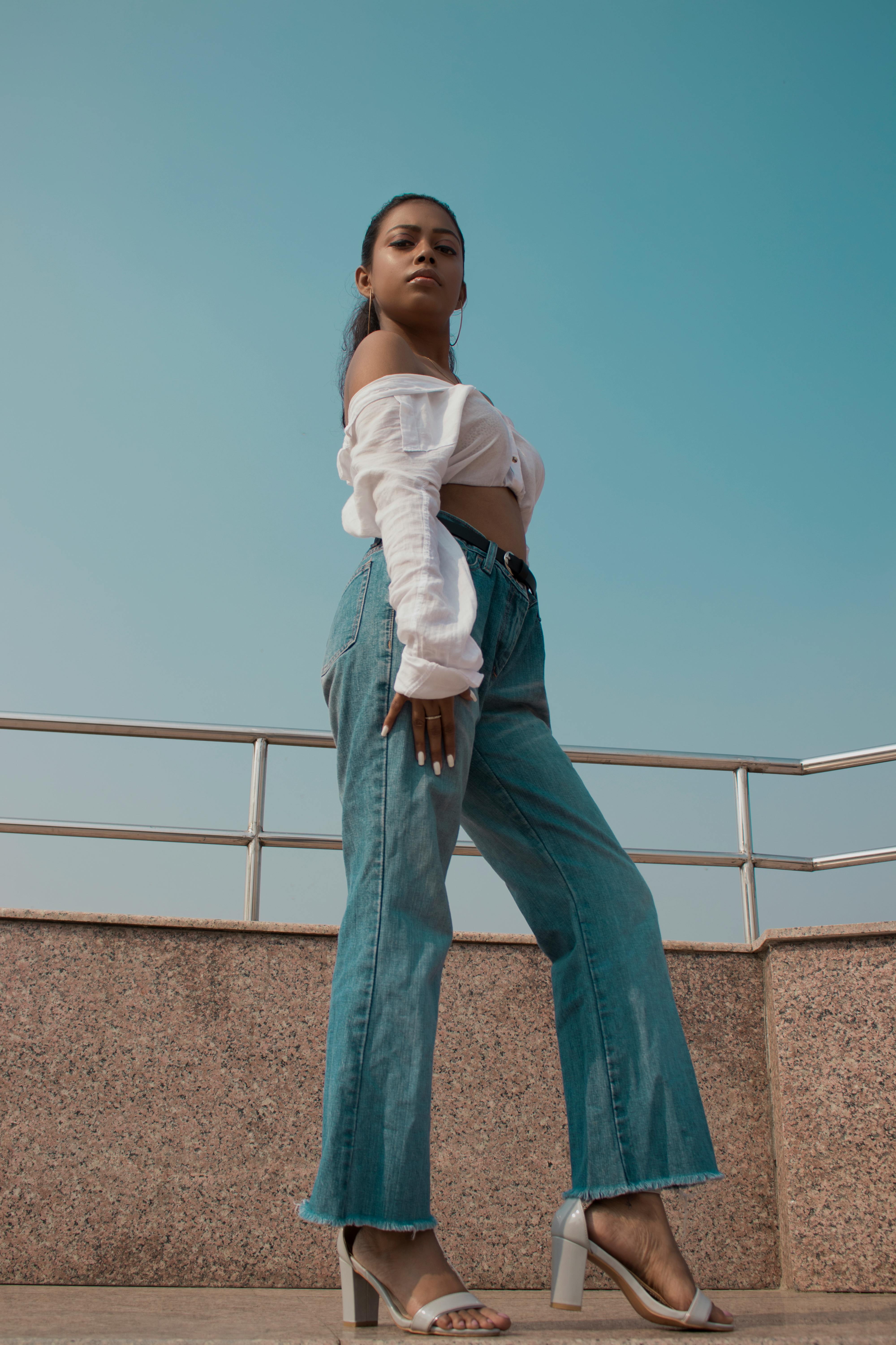 Woman Standing in Parking Lot · Free Stock Photo