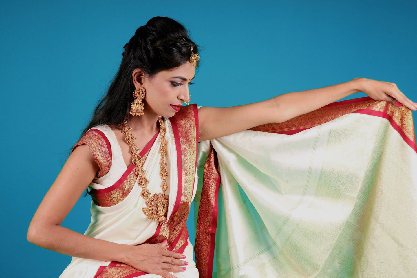 Woman in traditional Kalamkari saree