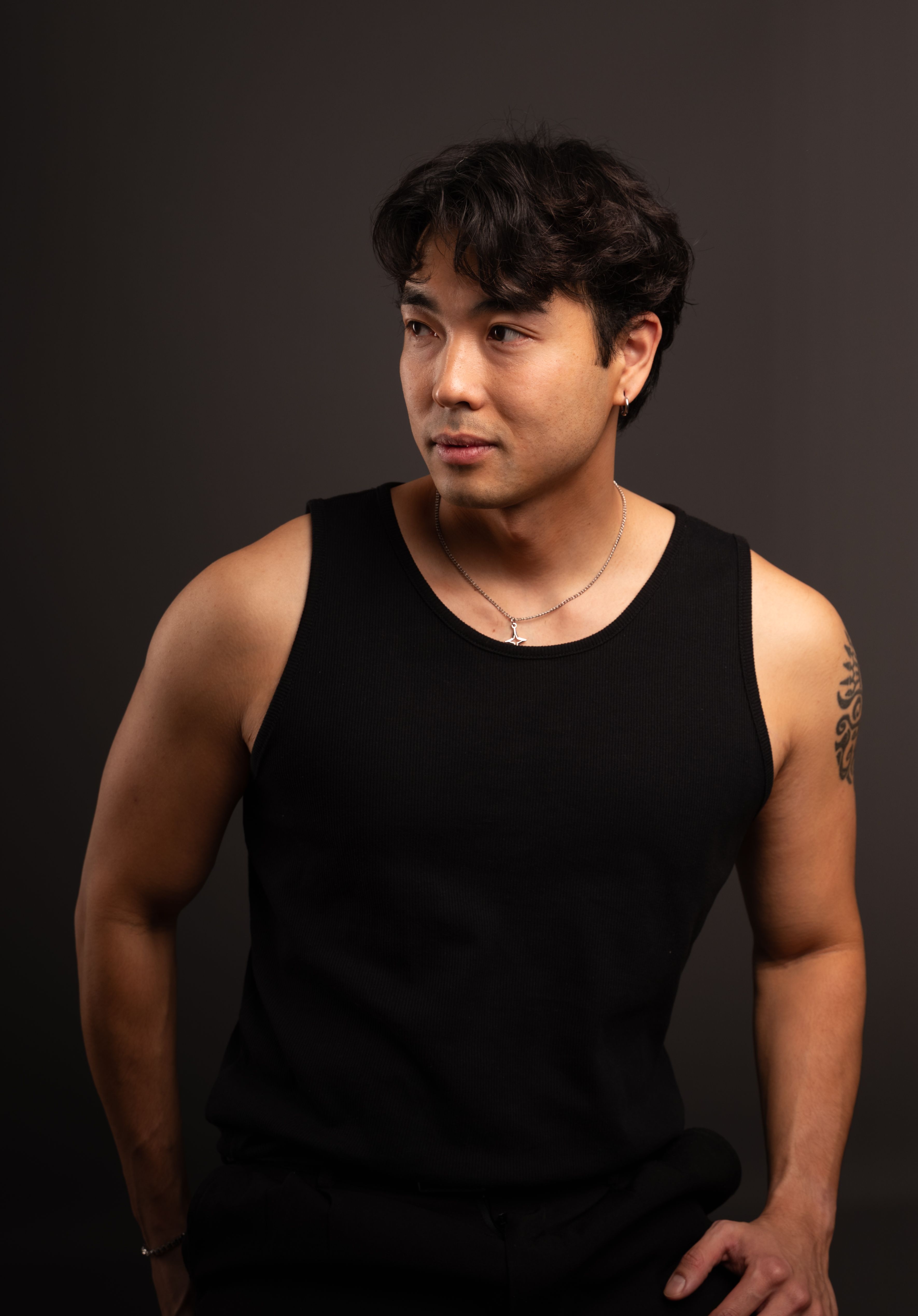 Confident Man in Black Tank Top Portrait · Free Stock Photo